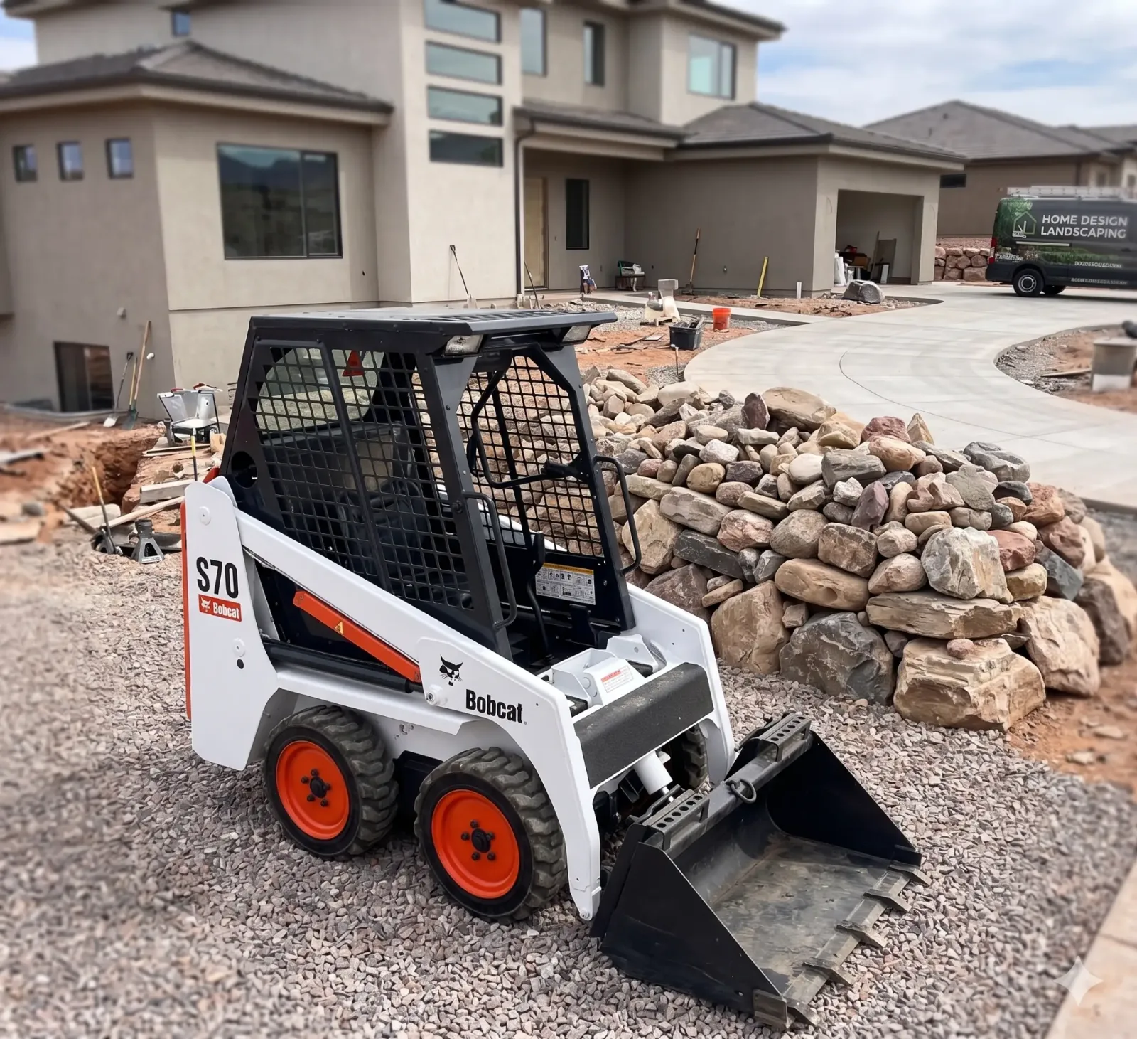 Graded and prepped lot after work with a Rent A Loader Bobcat S70
